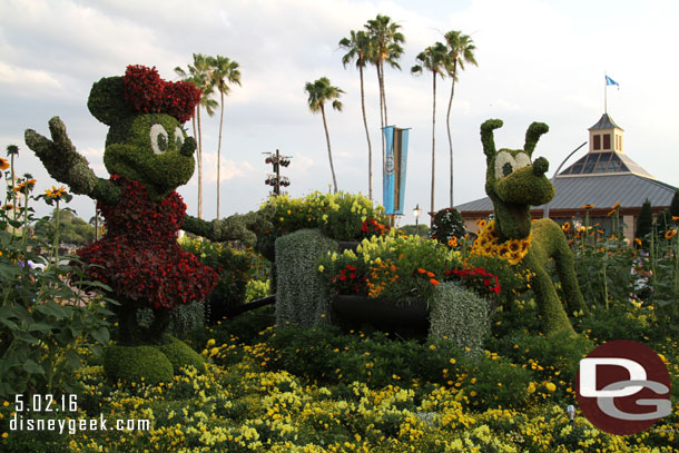 Minnie and Pluto as you enter World Showcase.