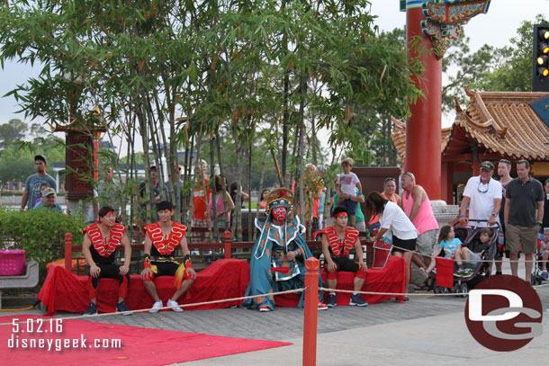 The rest of the group sitting and waiting to perform.