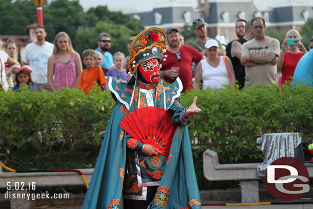 I do not recall seeing this performer before.  I believe it is called Bian Lian which is a mask changing dance.