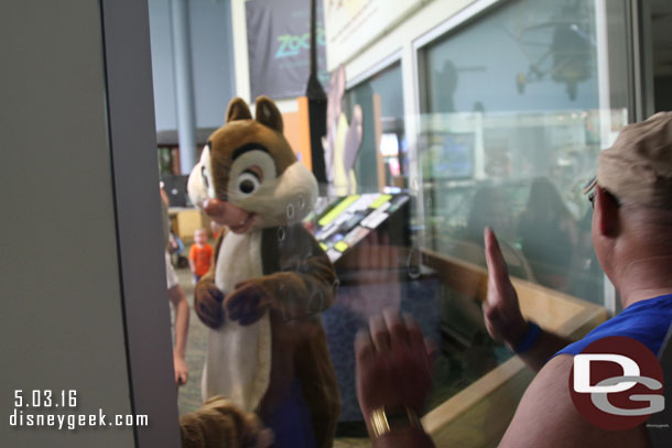 The chipmunks kept hitting the glass in between guests and drew an audience.