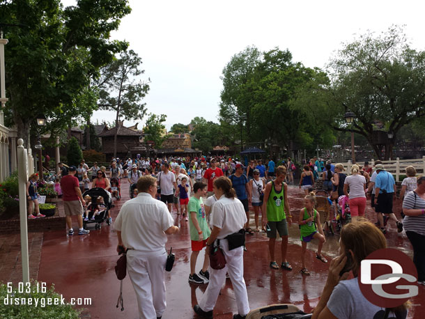 Outside the rain had sopped and the crowds returned to the walkways.