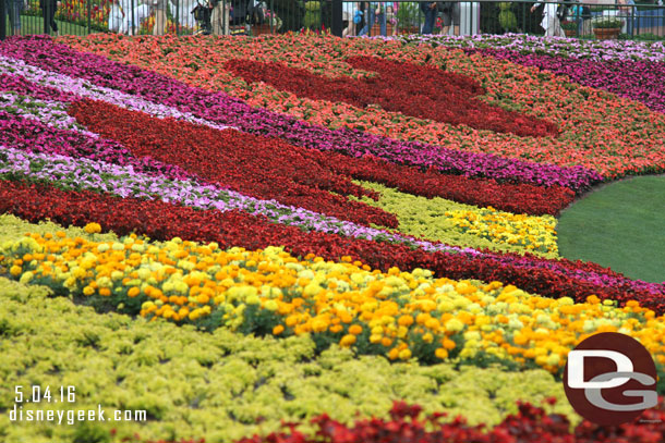 The large flower beds facing World Showcase