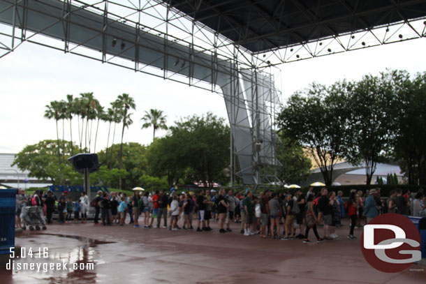 Guests waiting for Test Track to reopen.  Cars were starting to be cycled again since the rain had been stopped for a while.