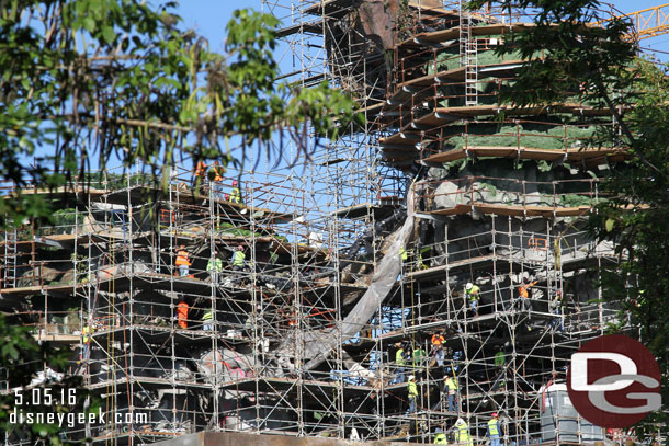 Several dozen workers visible on the scaffolding this morning.