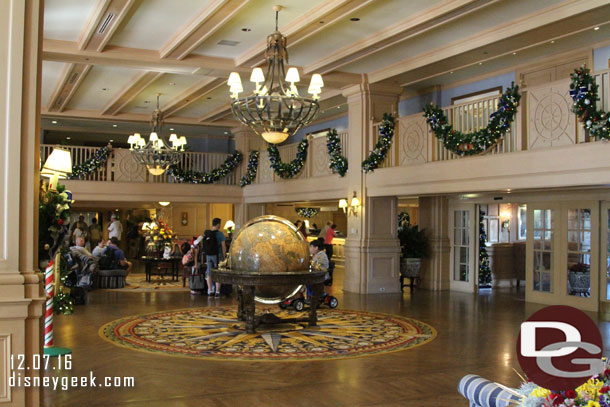 The globe was left in the center of the lobby entrance this year.  The tree pushed back further.