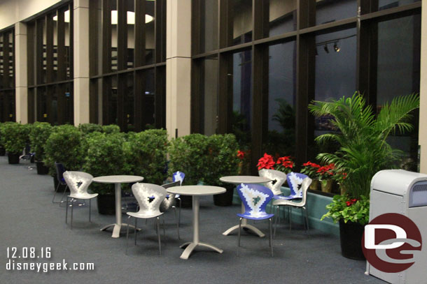 Tables and chairs to sit at in the hallway of Innoventions west