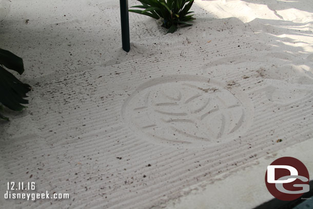 A stamp in the sand as you enter the greenhouse.