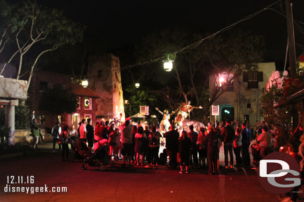 A group of guests watching the acrobats.