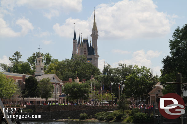 Cinderella Castle towering over Liberty  Square.