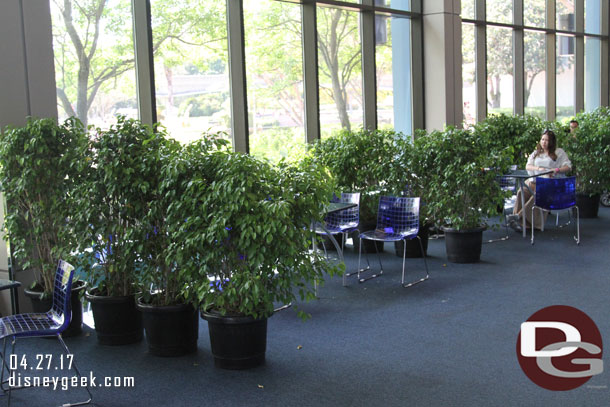 Places to sit with plants breaking up the area fill the Innoventions West walkway.  (It was this way in December too)