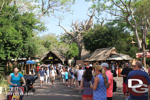 Had to check in for our tour at 9:45am.  The safari line was still spilling out into Harambe as they worked to open more queue.
