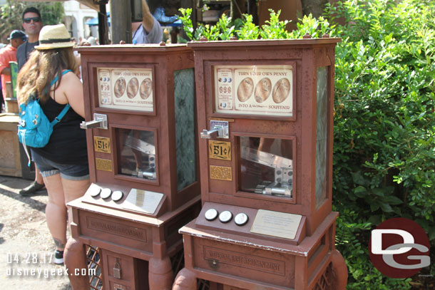 Noticed these two pressed coin machines in the area.