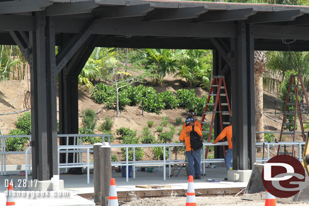 A look at the crew working on the queue rails.