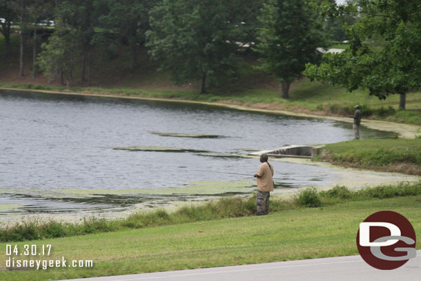 Something I do not recall seeing before.  People fishing in one of the retaining ponds.   These two guys were fishing in the pond as you exit  World Drive to Buena Vista Drive. 