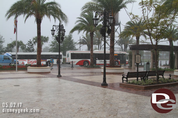 It was pouring as we arrived at Disney Springs and realized there is no rain cover near the drop off area.. you have to go a decent distance in the rain.