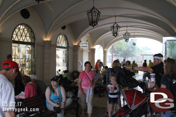 This walkway was the closest area of cover and a fair number of guests were hanging out there trying not to get soaked.