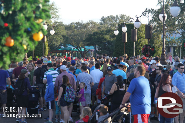 A large group gathered on the walkway to the Seven Dwarfs Mine Train.