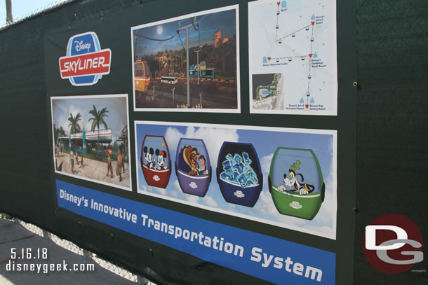 The wall has some concept art and a map for the Skyliner.