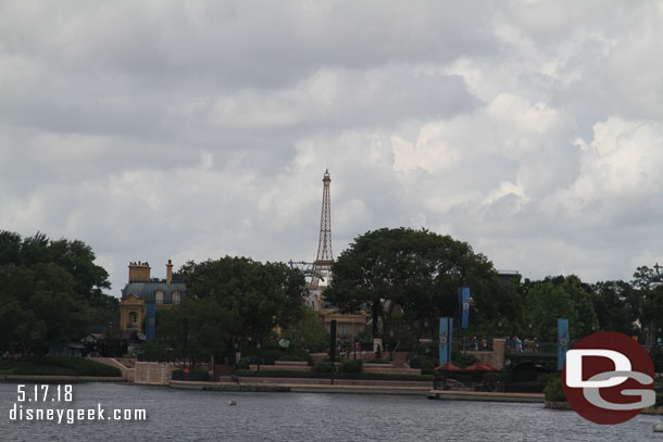 A Skyliner support tower is visible just to the left of the Eiffel tower.