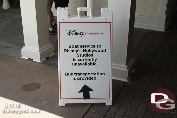 Signs near the lobby for bus transportation.