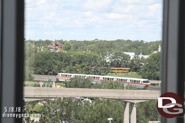 From the elevator lobby a monorail and glimpse of a train going by.