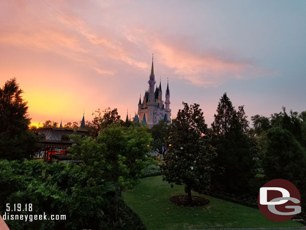 The clouds continued to clear and we were treated to a great sunset.  Here is Cinderella Castle beyond the trees.