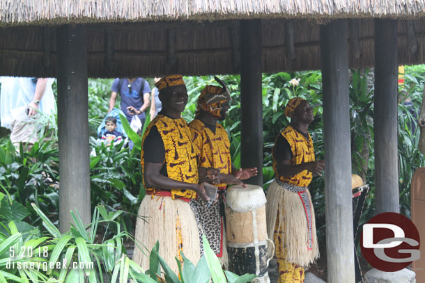 Drummers in the queue.. well under cover near the queue.