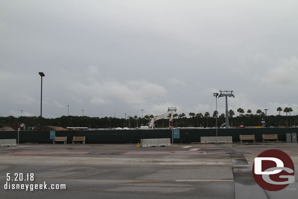 Pulling into Disney's Hollywood Studios parking lot.  Skyliner towers mark a path through the lot.