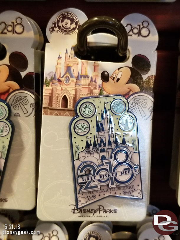 Thought this pin was interesting.. first the backing with the castle that did not look right.  Then secondly the choice of the small world clock for the Magic Kingdom icon.