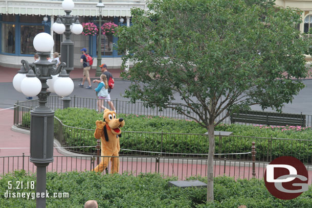 Pluto arriving in Town Square.