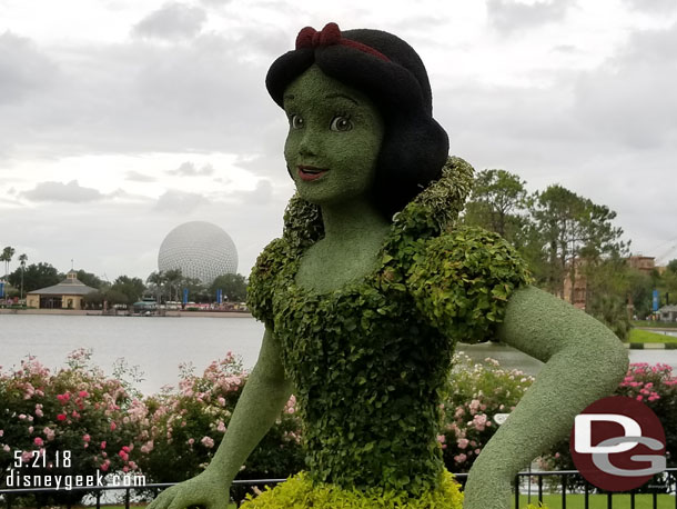 Snow White topiary with Spaceship Earth