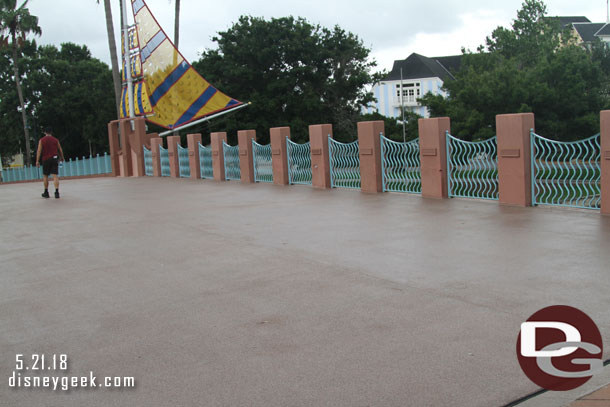 The bridge is open to pedestrians as they work underneath it.