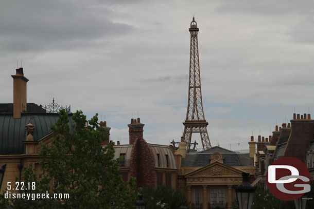 12:14pm passing by France trying to decide on lunch. Notice the top of a Skyliner tower is visible behind the Eiffel Tower