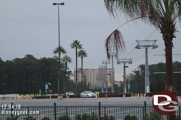 Looking across the parking lot you can see the Skyliner station (the smaller white building).  The large hotel in the distance is a Bonnet Creek Hotel, not Disney's.