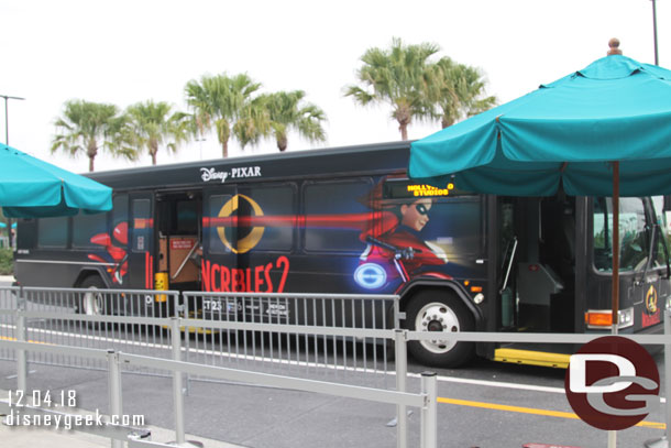 An Incredibles 2 wrapped bus.
