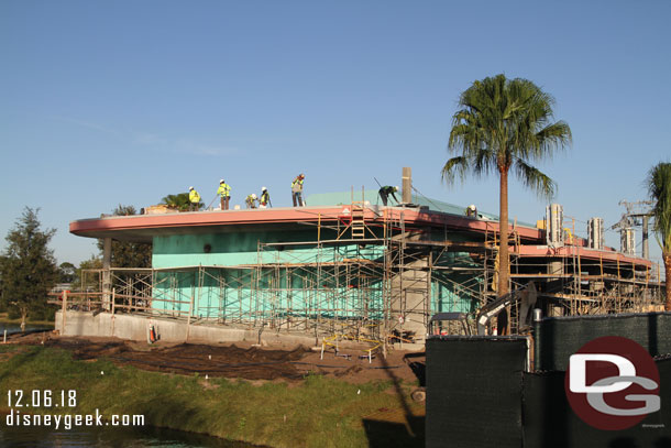 Crews working on the roof of the Disney Skyliner station.
