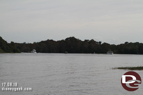 Several boats cruising Bay Lake.