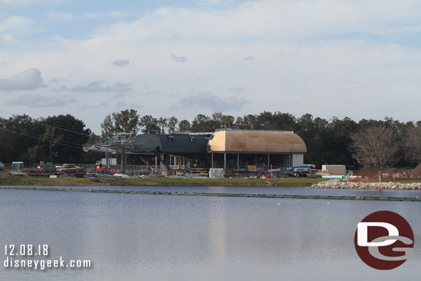 To the left is the Disney Skyliner station at the Riviera Resort.  This is on the Epcot line.  Coming in from the left is the line from the Caribbean Beach resort station.  Then it makes a 90 degree turn and heads toward the turn station near the Boardwalk before turning to head to the International Gateway station.