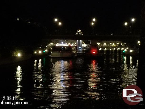 Friendship Boats lined up in the channel and under the bridges waiting for the all clear to enter Epcot and dock for the evening.