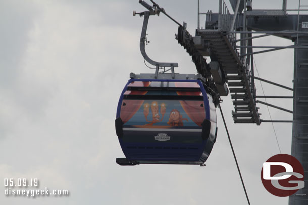 Beauty and the Beast Gondola approaching featuring Lumiere and Cogsworth on this side.