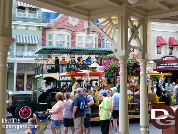 An Omnibus and Trolley passing.