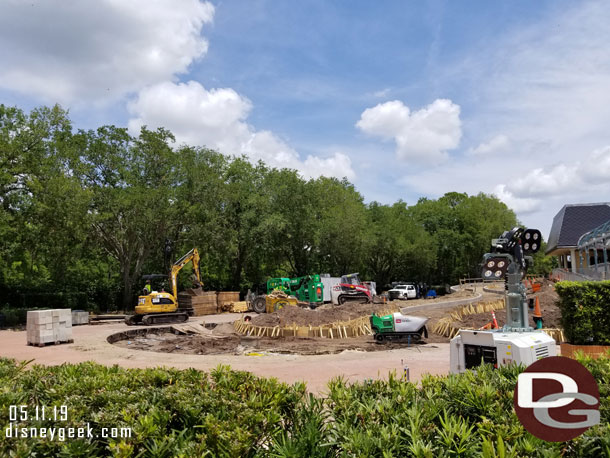 They are creating a new walkway to the Skyliner station.  Forms are up for the curbs.  Guessing that curved path will be the entry queue and exit will be straight out down a ramp.