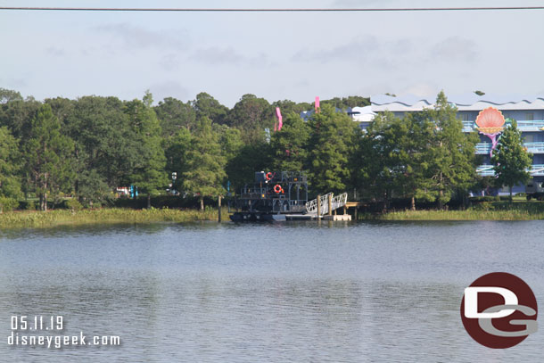 The support boat on the far shore.