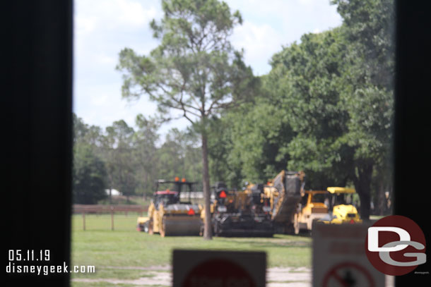 Construction equipment staged, looks like some road work underway.