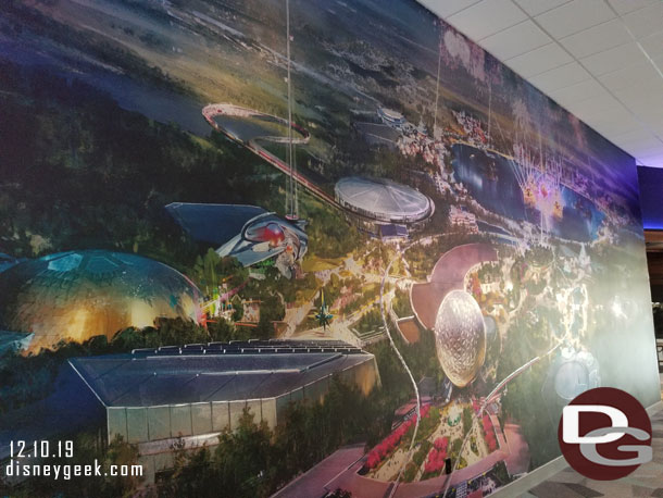 A large piece of concept art on the back wall.