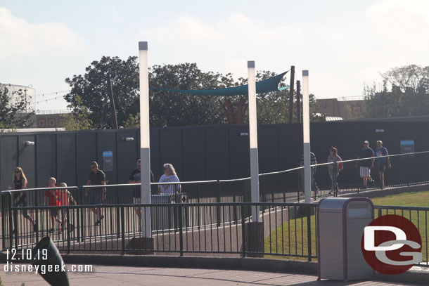 Large pole lights line the walkway.  Guessing future walkways will have these.  I am not a fan of more visual intrusion/distraction, but they look like they would provide a lot more light than the current ones.