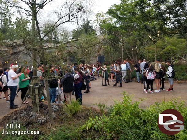 There are two lines of cast members you need to cross through to enter.. the first asks your group number and answers questions. Then the second scans your Magic Band.