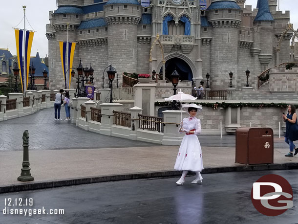 Mary Poppins out for a stroll on this rainy morning.