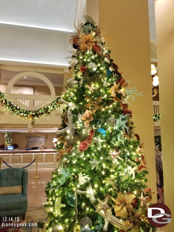 The Christmas tree is decorated with a beach theme.