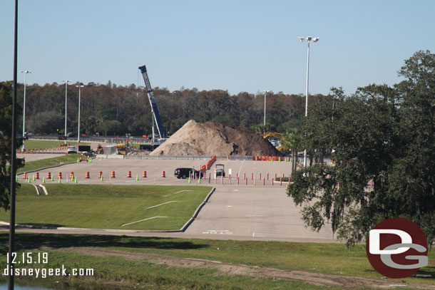 A mound of dirt has been excavated from an expanded retention pond that is being created where the raceway once stood.